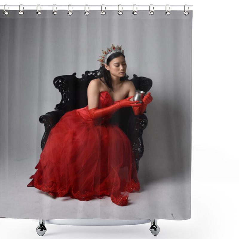 Personality  Full Length  Portrait Of Beautiful Young Asian Woman Wearing Red Corset, Long Opera Gloves And Ornate Gothic Queen Crown. Graceful Posing While Seated On Chair, Isolated On Studio Background. Shower Curtains