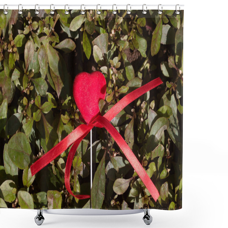 Personality  Red Heart-shaped Decoration With A Ribbon Bow On A Stick, Placed Against A Lush Green Leafy Background, Perfect For Valentine's Day, Love, Romance, Or Nature-themed Designs. Shower Curtains