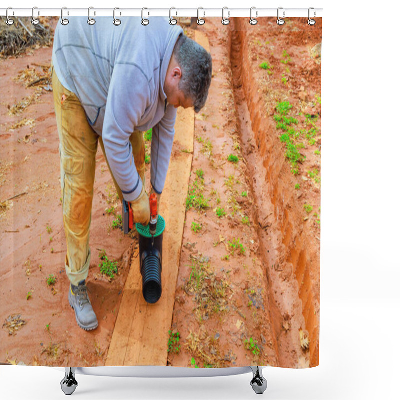 Personality  Man Is Fixing Drainage Pipe For Enhance Water Flow Management In Freshly Dug Earth Trench Shower Curtains