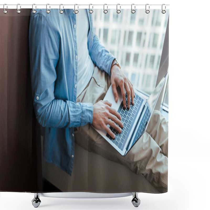 Personality  Cropped View Of IT Worker Using Laptop On Windowsill Near Window Shower Curtains