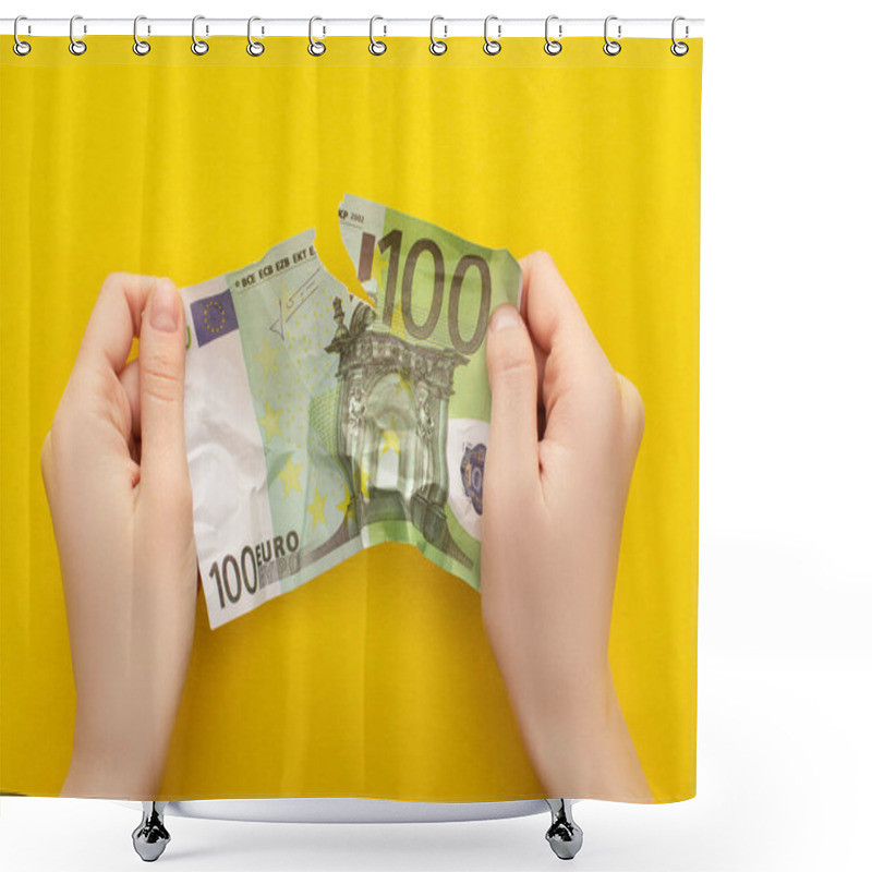 Personality  KYIV, UKRAINE - MARCH 25, 2020: Cropped View Of Woman Tearing Crumpled Euro Banknote Isolated On Yellow Shower Curtains