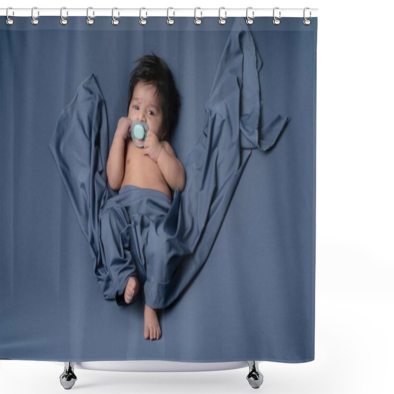 Personality  Portrait Of Baby Boy With Pacifier Leaning On The Bed Covering By Blue Shawl Shower Curtains