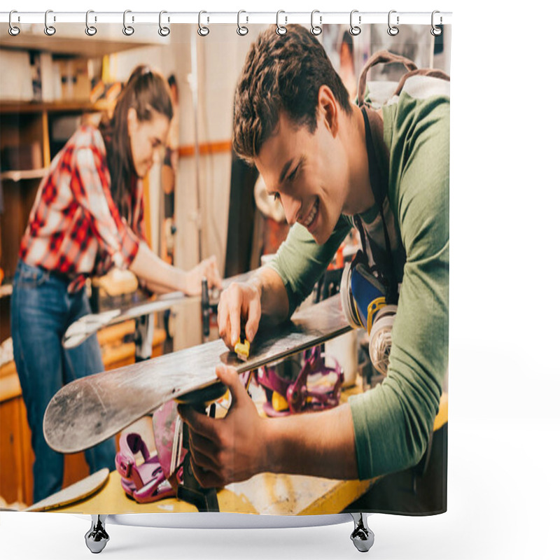 Personality  Selective Focus Of Smiling Worker Using Box Cutter On Ski In Repair Shop Shower Curtains