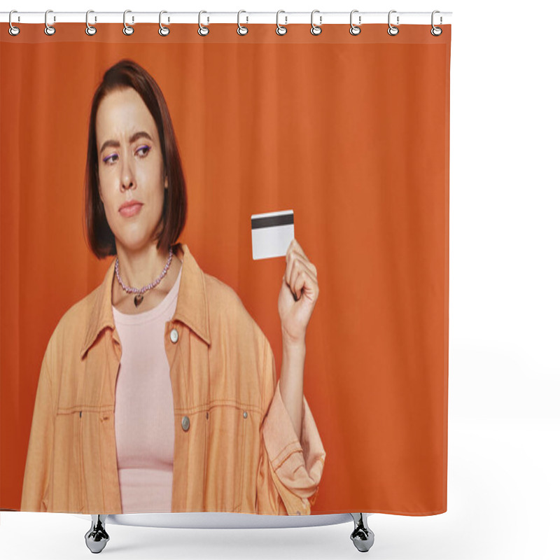 Personality  Thoughtful Young Woman With Short Hair Holding Credit Card On Orange Background, Personal Finance Shower Curtains