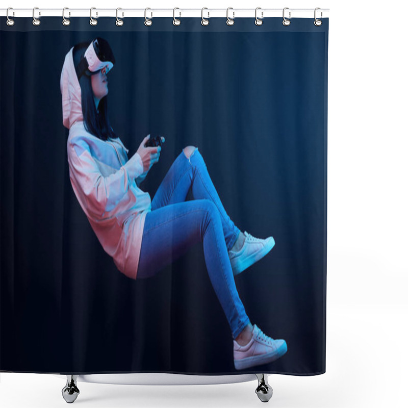 Personality  KYIV, UKRAINE - APRIL 5, 2019: Brunette Woman Levitating And Holding Joystick While Playing Video Game And Wearing Virtual Reality Headset On Blue   Shower Curtains