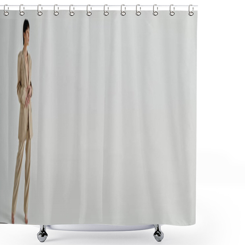 Personality  A Woman In A Stylish Tan Suit Stands In Front Of A Plain White Wall, Her Expression Confident. Shower Curtains