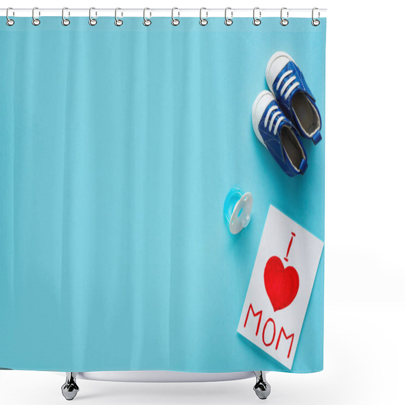 Personality  Top View Of Greeting Card With I Love Mom Lettering Near Pacifier And Baby Booties On Blue Background Shower Curtains