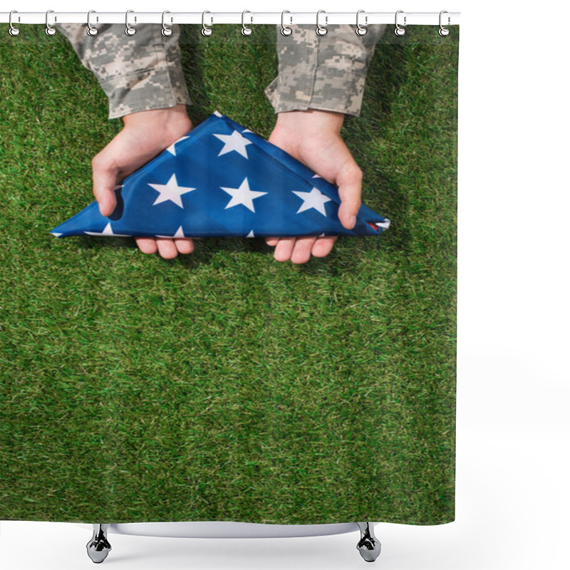 Personality  Partial View Of Soldier In Military Uniform Holding Folded Flag In Hands On Green Grass, 4th July Holiday Concept Shower Curtains