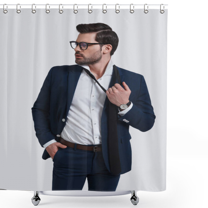 Personality  Exhausted Young Man In Full Suit Looking Away And Taking Off His Necktie In Studio Shower Curtains