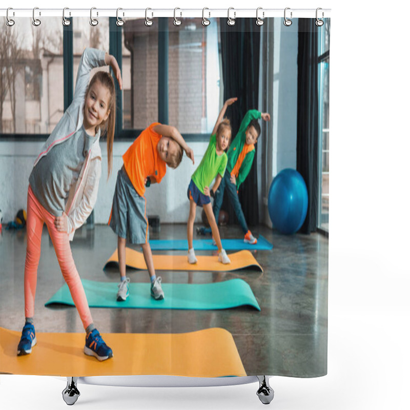 Personality  Selective Focus Of Multicultural Children Warming Up On Fitness Mats In Gym Shower Curtains