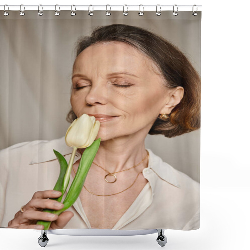 Personality  A Mature, Attractive Woman Comfortably Smelling A White Tulip. Shower Curtains