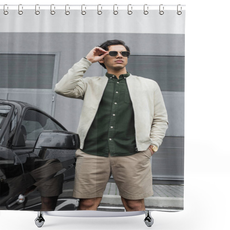 Personality  Young Man In Stylish Sunglasses And Bomber Jacket Standing With Hand In Pocket Near Modern Car Outside Shower Curtains