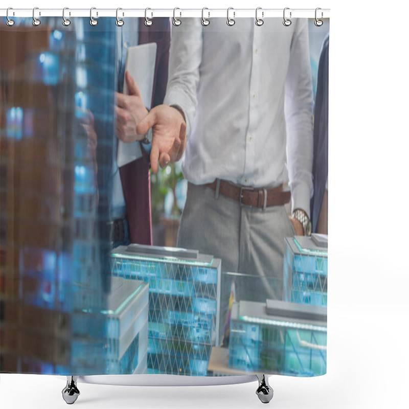 Personality  Cropped Shot Of Businessman Showing Miniature Model Of Modern City To Clients Shower Curtains