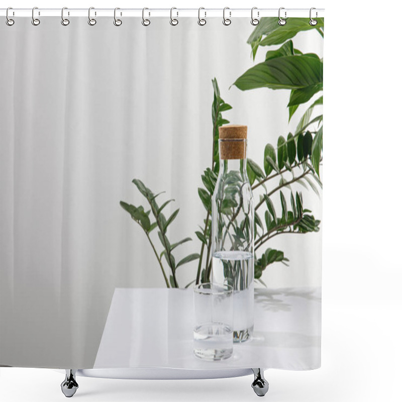 Personality  Glass And Bottle Of Fresh Water Near Green Plants On White Surface Isolated On Grey Shower Curtains