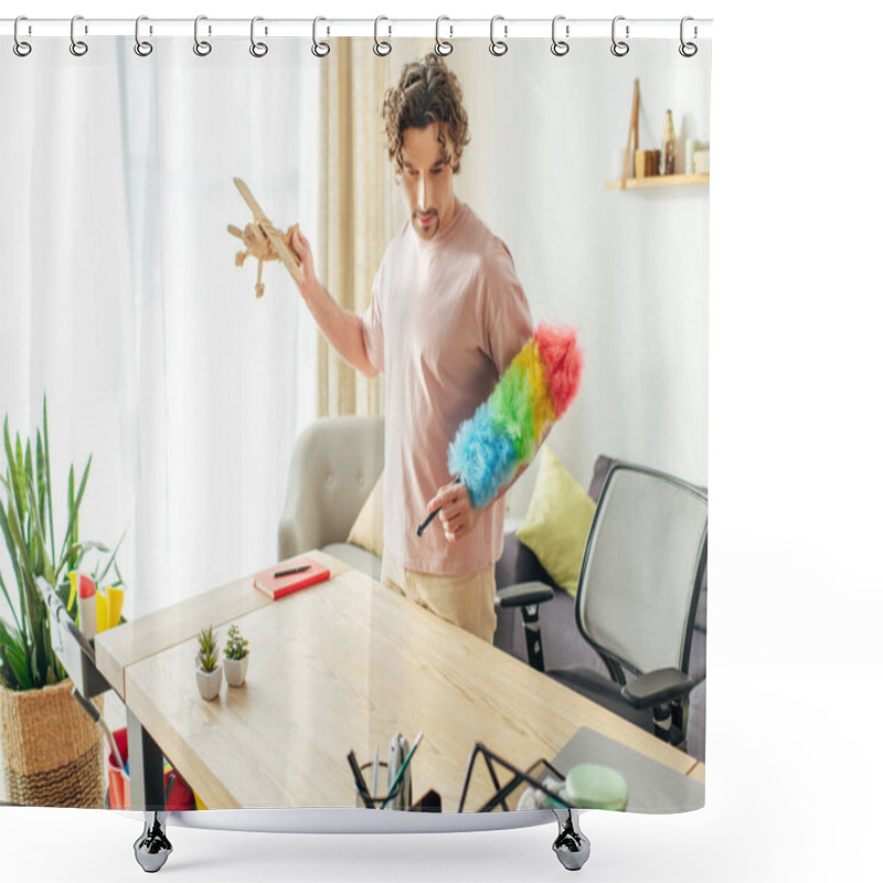 Personality  A Man In Cozy Attire Holding A Toy Airplane In A Living Room. Shower Curtains