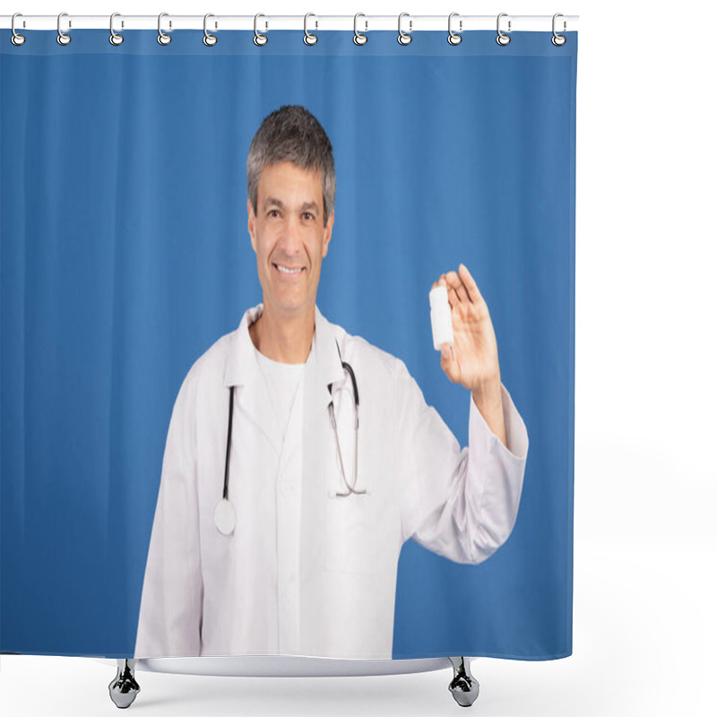 Personality  A Mature Caucasian Man Dressed In A Doctors Coat Stands Against A Blue Background. He Smiles And Holds A Medical Item, Showcasing A Friendly And Professional Demeanor. Shower Curtains