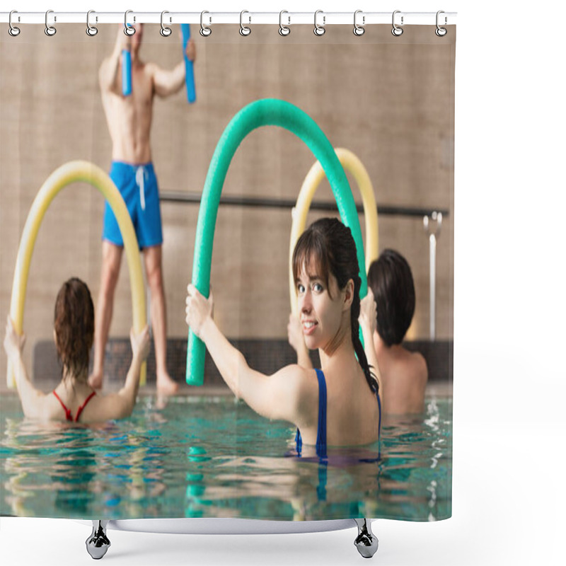 Personality  Selective Focus Of Woman Smiling At Camera While Holding Pool Noodle During Water Aerobics Shower Curtains