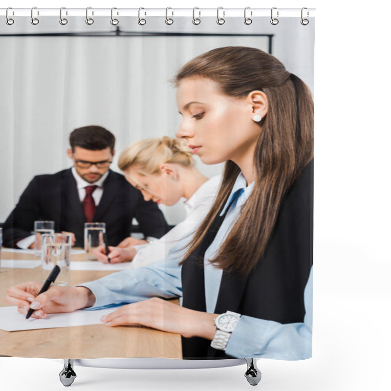 Personality  Attractive Young Businesswoman Writing On Blank Paper During Conference With Colleagues Shower Curtains