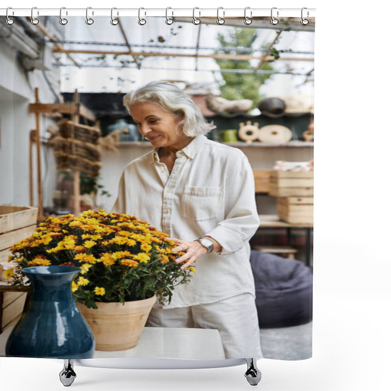 Personality  A Beautiful Mature Woman Tends To A Large Pot Of Blooming Flowers, Surrounded By Rustic Decor. Shower Curtains