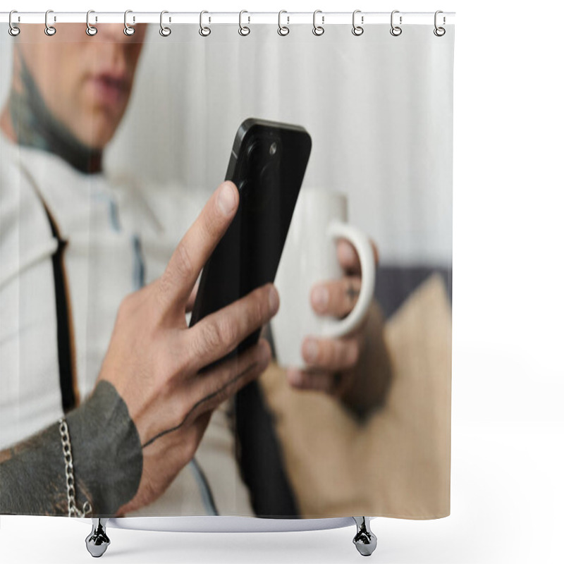 Personality  Handsome Young Man With Tattoos Relaxes On A Couch, Sipping Coffee And Using His Smartphone. Shower Curtains