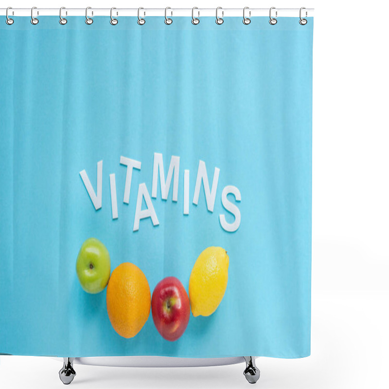 Personality  Top View Of Ripe Fruits And Word Vitamins On Blue Background Shower Curtains