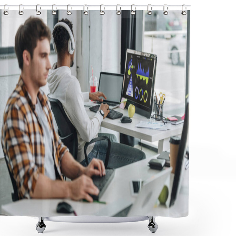 Personality  Back View Of African American Programmer In Headphones Sitting Near Computer Monitor With Graphs And Charts On Screen Near Colleague In Office Shower Curtains