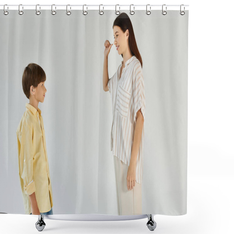 Personality  A Young Boy And His Mother Share A Moment Of Sign Language Communication In A Warm Setting. Shower Curtains