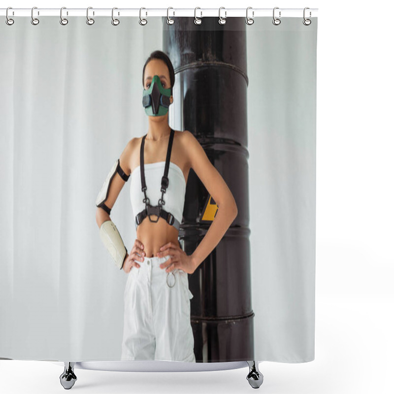 Personality  Futuristic African American Woman In Safety Mask With Hands On Hips Near Radioactive Waste Barrels Isolated On White Shower Curtains