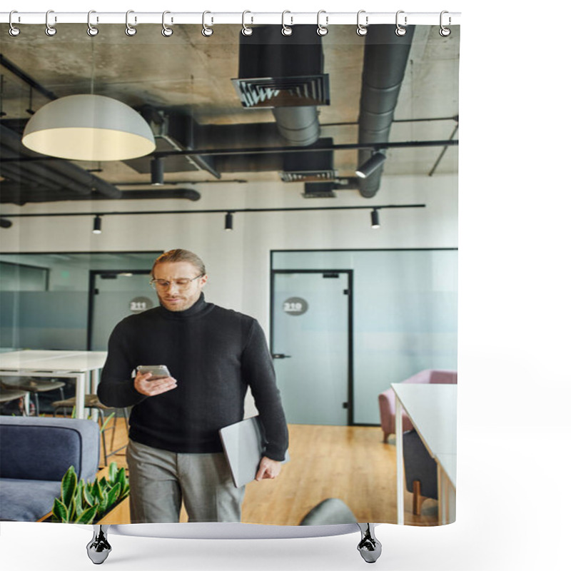 Personality  Serious And Stylish Entrepreneur In Eyeglasses And Black Turtleneck Holding Laptop And Networking On Smartphone In Contemporary Office With High Tech Interior, Successful Business Concept Shower Curtains