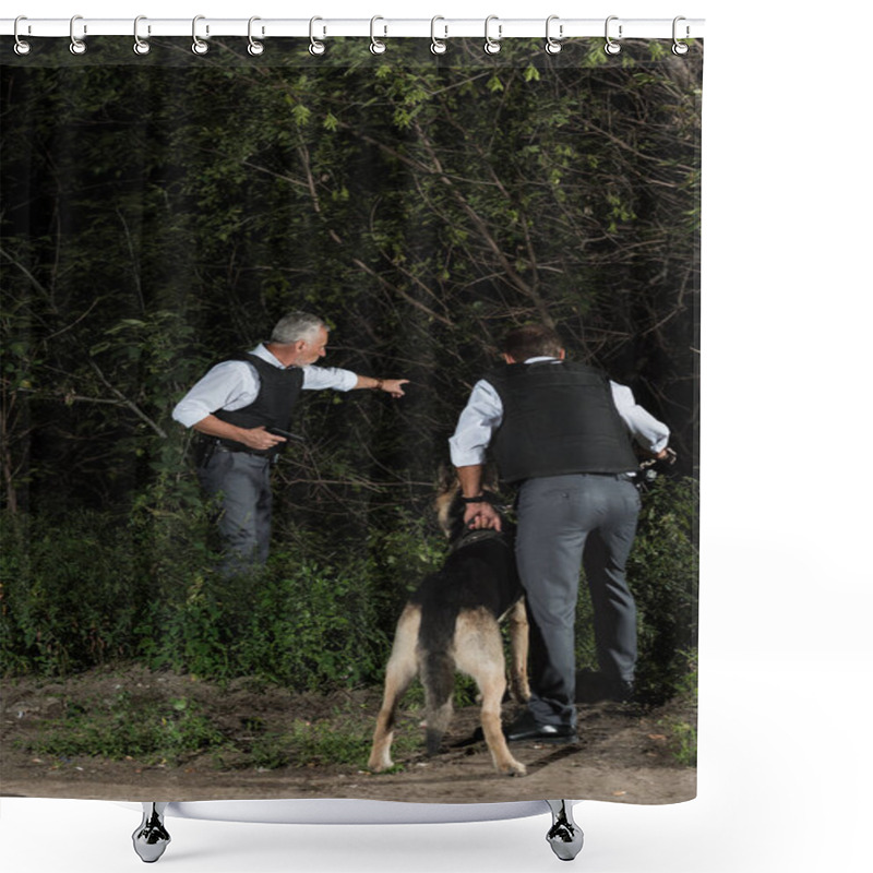 Personality  Mature Policeman With Gun Pointing By Finger To Colleague With Alsatian On Leash Near Forest Shower Curtains