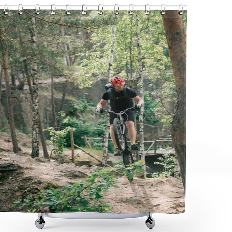 Personality  Male Extreme Cyclist In Protective Helmet Balancing On Back Wheel Of Mountain Bicycle In Forest Shower Curtains