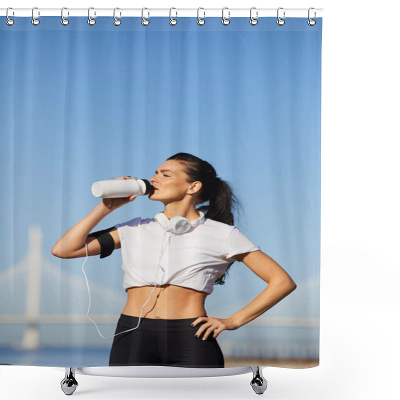 Personality  Serious Confident Attractive Sporty Lady With Smartphone Armband And Headphones Standing Outdoors And Drinking Water From Bottle Shower Curtains