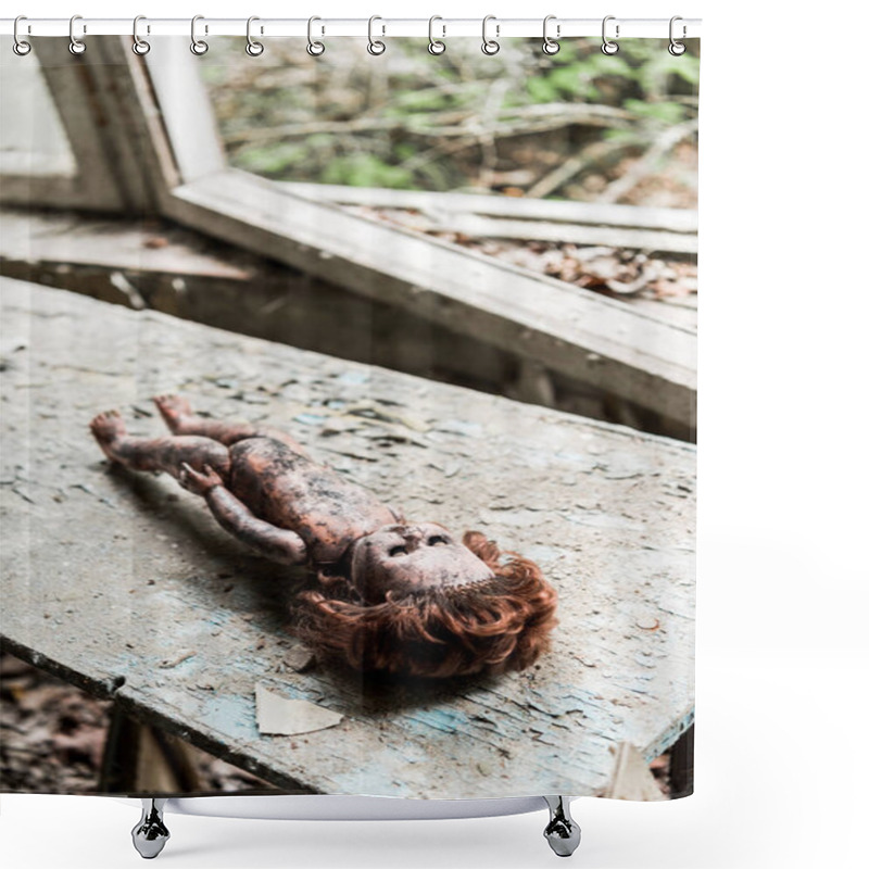 Personality  Selective Focus Of Creepy Burnt Baby Doll On Wooden Damaged Desk  Shower Curtains