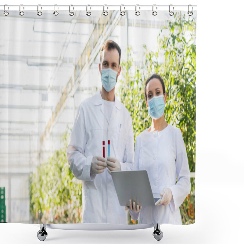 Personality  Multiethnic Quality Inspectors In Medical Masks Looking At Camera While Standing With Test Tubes And Laptop In Greenhouse Shower Curtains