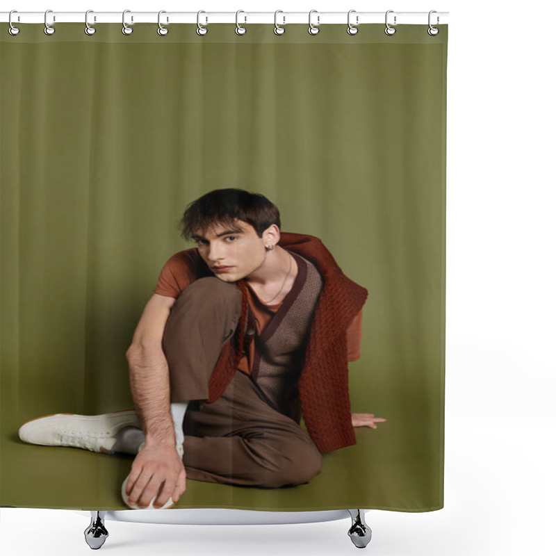 Personality  A Stylish Man Poses In A Studio, Wearing A Brown Sweater And Pants. Shower Curtains