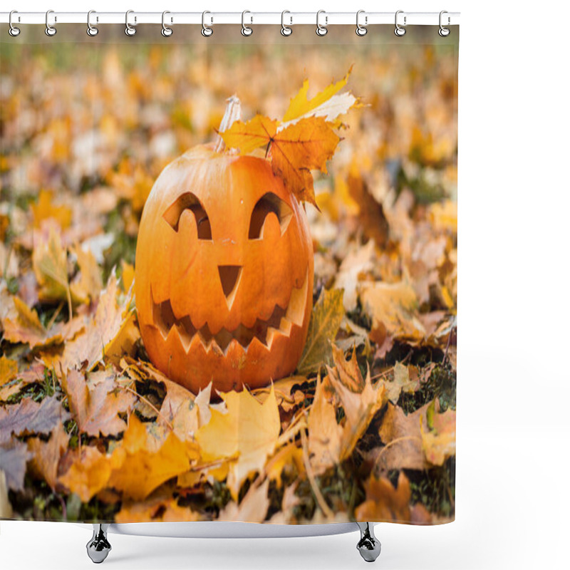 Personality  Orange Pumpkin For Halloween Outdoors In Orange Autumn Leaves.Halloween Concept. Shower Curtains