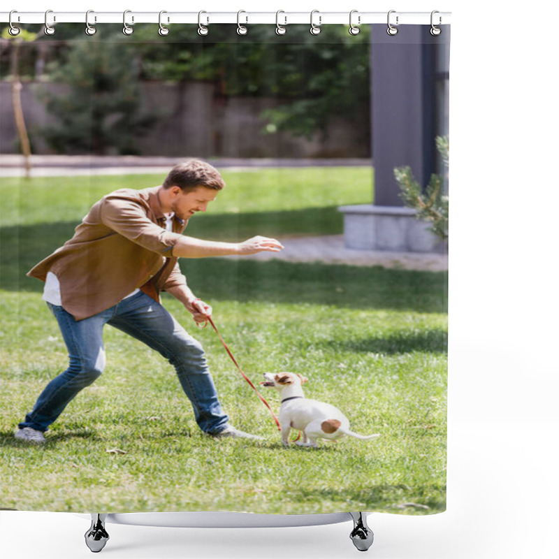 Personality  Selective Focus Of Man In Jeans Playing With Jack Russell Terrier On Leash In Park  Shower Curtains