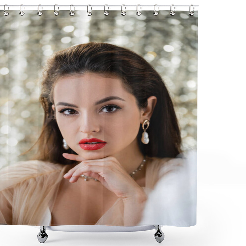 Personality  Brunette Woman With Makeup And Pearl Earrings Holding Hand Near Chin And Looking At Camera On Shiny Background Shower Curtains