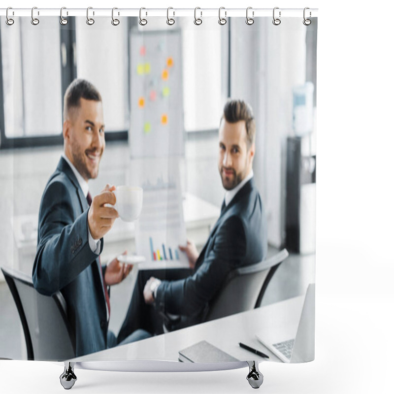 Personality  Selective Focus Of Cup With Drink In Hand Of Cheerful Businessman Near Coworker Holding Paper With Graphs Shower Curtains