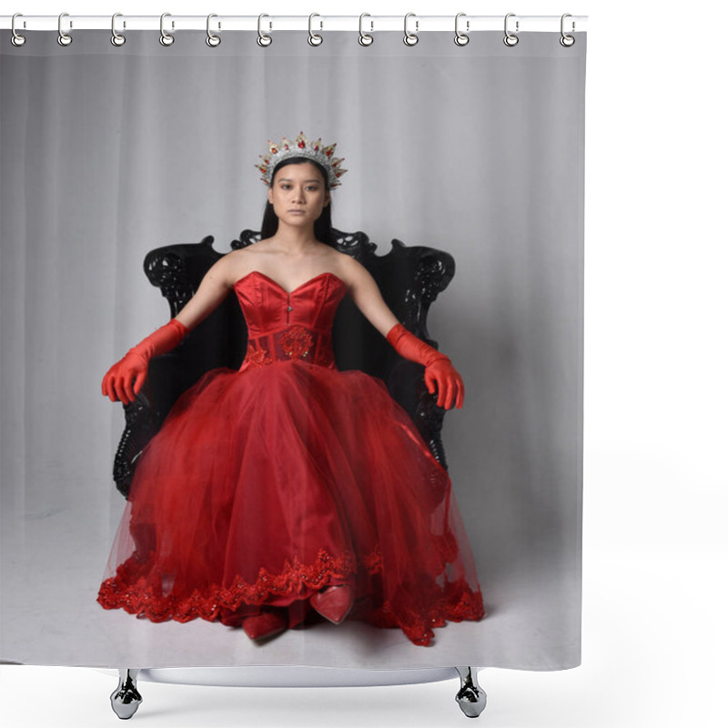 Personality  Full Length  Portrait Of Beautiful Young Asian Woman Wearing Red Corset, Long Opera Gloves And Ornate Gothic Queen Crown. Graceful Posing While Seated On Chair, Isolated On Studio Background. Shower Curtains