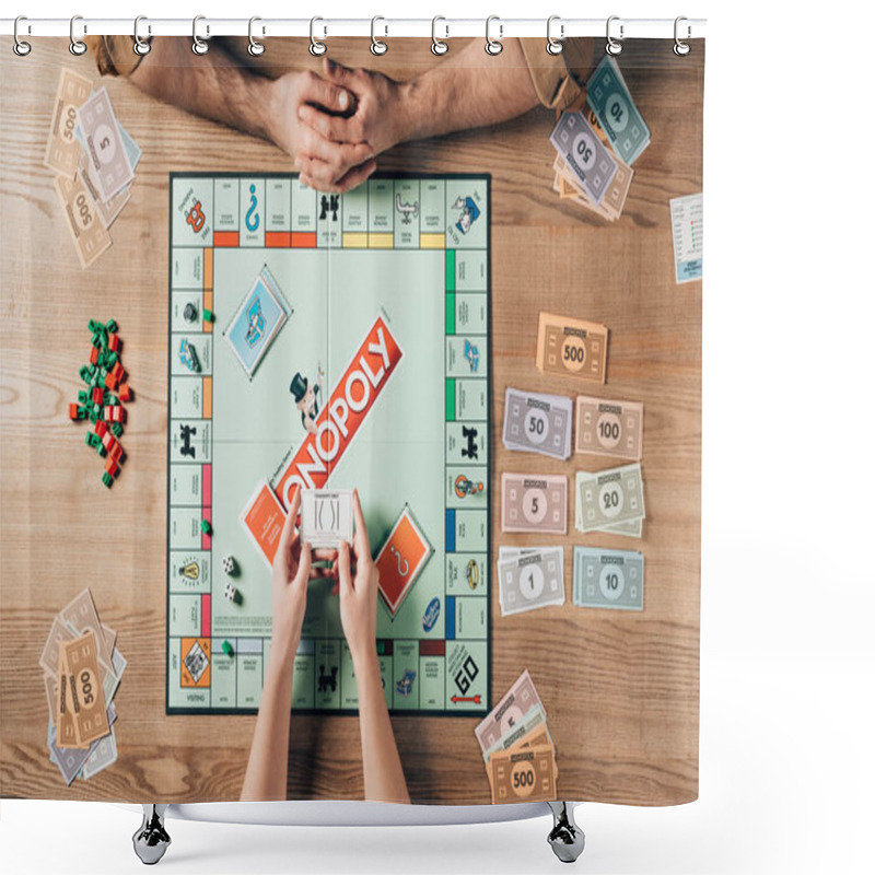 Personality  KYIV, UKRAINE - NOVEMBER 15, 2019: Cropped View Of Woman And Man Playing Monopoly Board Game At Table Shower Curtains