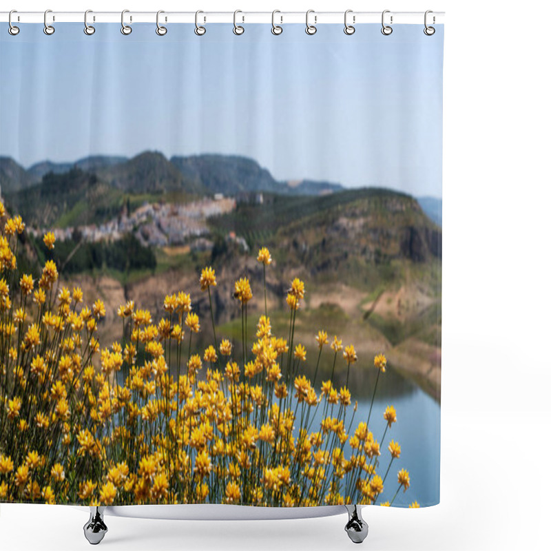 Personality  A Vibrant Foreground Of Yellow Wildflowers With A Blurred Background Featuring A Village Nestled In The Hills Above A Tranquil Reservoir, Under A Clear Blue Sky Shower Curtains