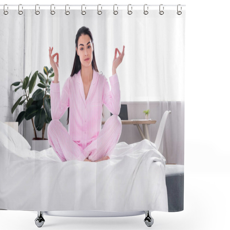 Personality  woman in pink pajamas sitting in lotus pose on bed in morning at home shower curtains