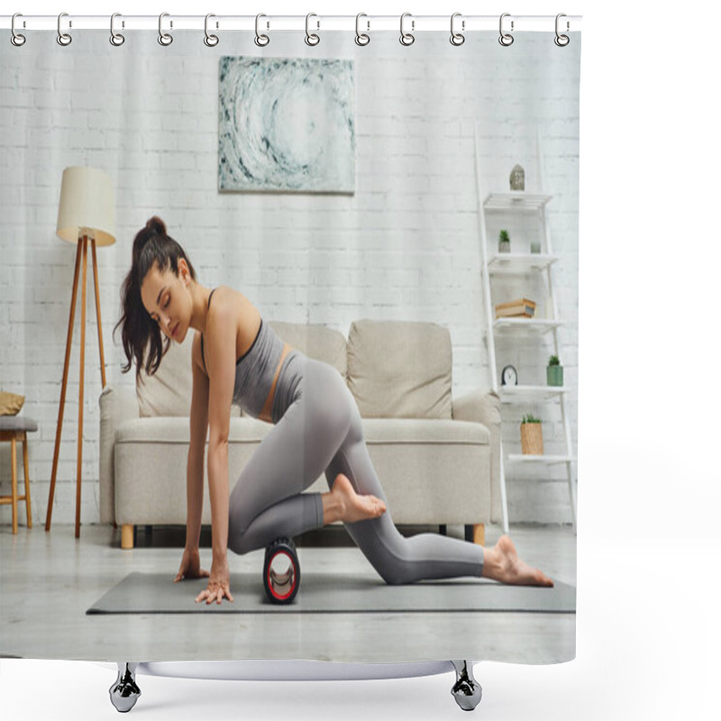 Personality  Young Brunette Woman In Sportswear Massaging Leg With Roller Massager For Lymphatic Circulation On Fitness Mat In Modern Living Room At Home, Sense Of Tranquility And Promote Relaxation Concept Shower Curtains