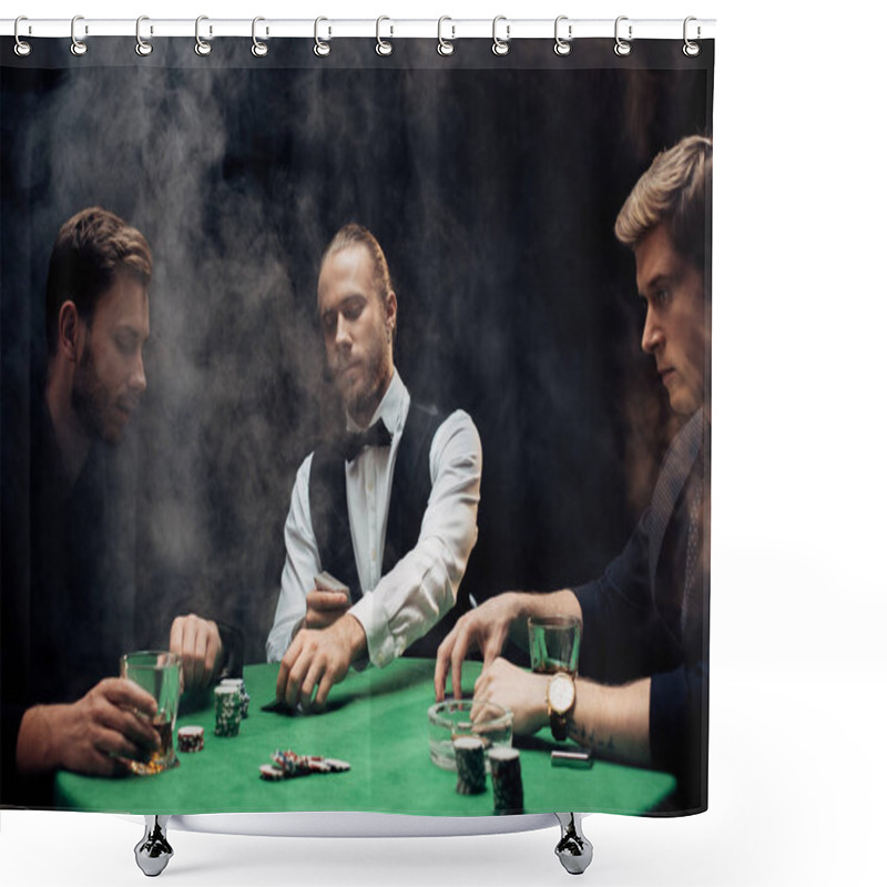 Personality  KYIV, UKRAINE - AUGUST 20, 2019: Croupier Holding Playing Cards Near Men On Black With Smoke  Shower Curtains