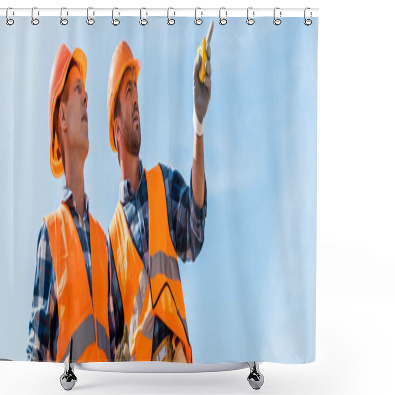 Personality  Panoramic Shot Of Handsome Constructor Pointing With Finger While Standing Against Blue Sky  Shower Curtains