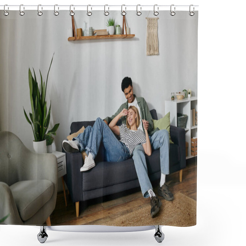 Personality  A Young Multicultural Couple Laughs And Enjoys Each Others Company On A Comfortable Couch In Their Modern Apartment. Shower Curtains