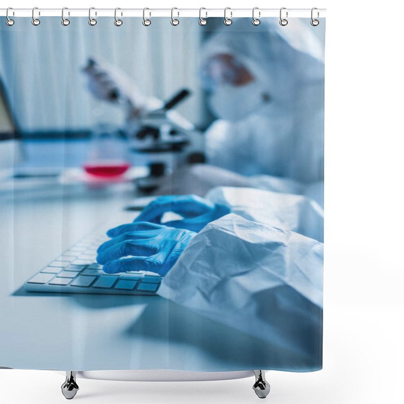 Personality  Scientist In Latex Gloves Typing On Computer Keyboard While Colleague Working On Blurred Background Shower Curtains