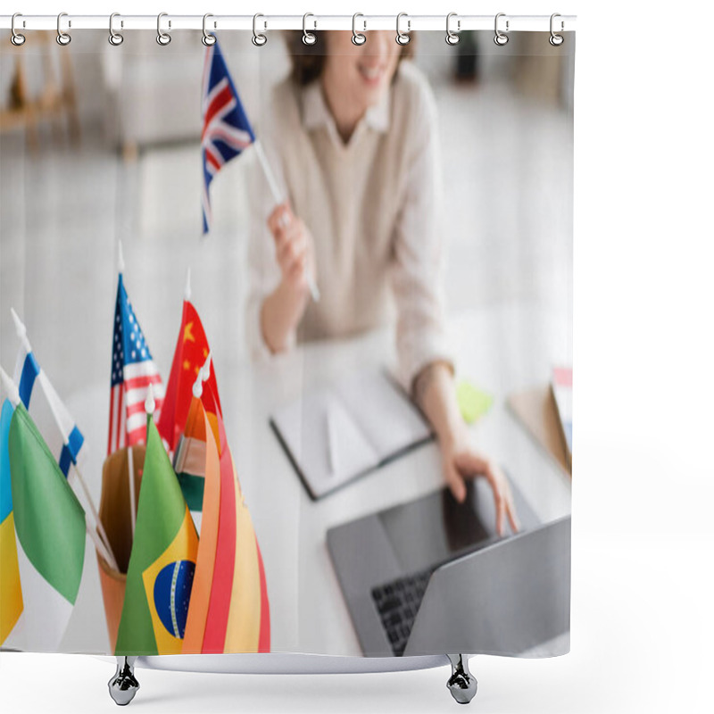 Personality  Selective Focus Of International Flags Near Teacher Of Foreign Languages Using Laptop On Blurred Background  Shower Curtains