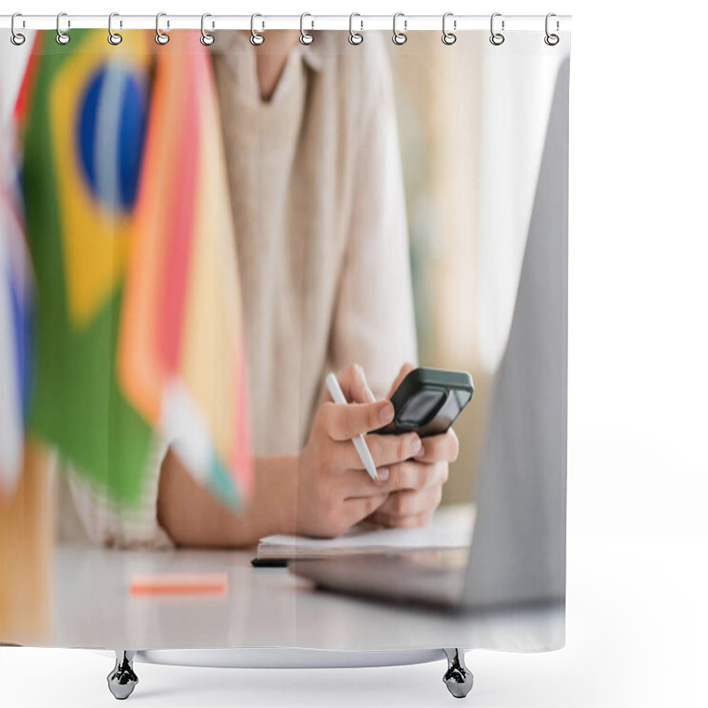 Personality  Cropped View Of Language Teacher Using Mobile Phone Near Laptop And Flags On Blurred Foreground  Shower Curtains